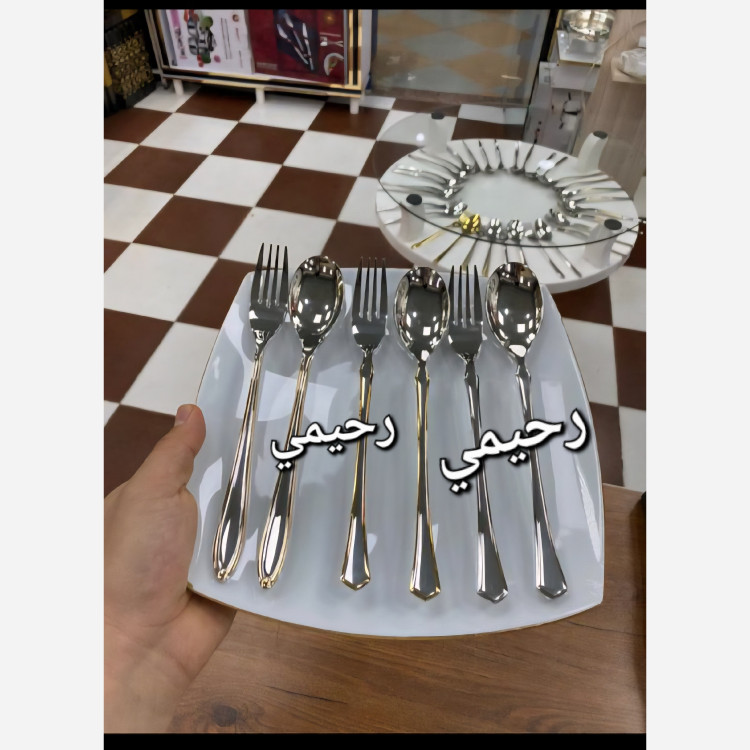 سرویس قاشق و چنگال 24 نفره 120 پارچه یونیک بیچمدان دور نوار طلایی نیمه طلایی
